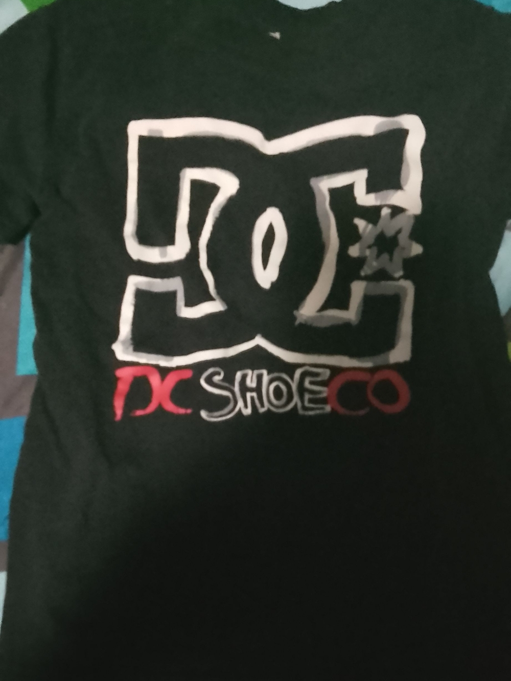 DC Black Tee with White Logo and Red Accent